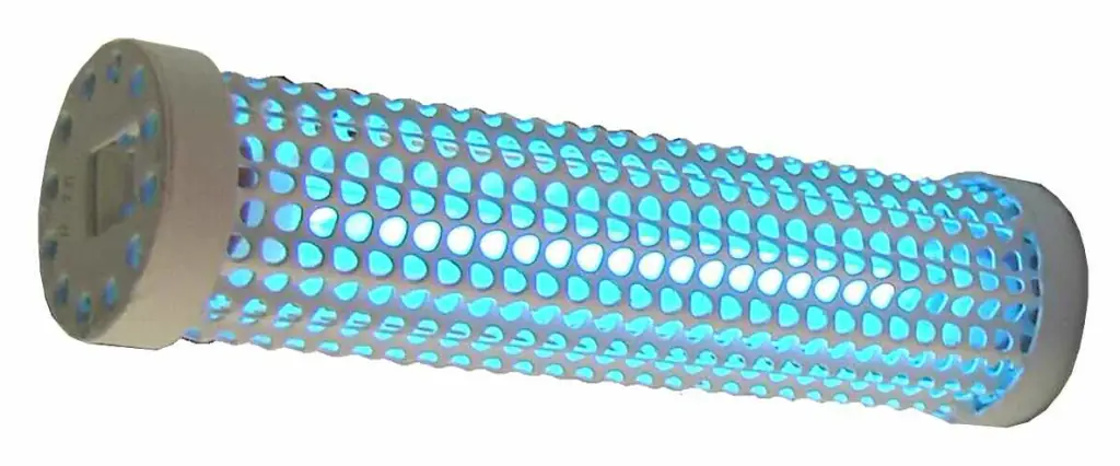 A PHI-Cell, its perforated sleeve lit blue from the UV lamp inside
